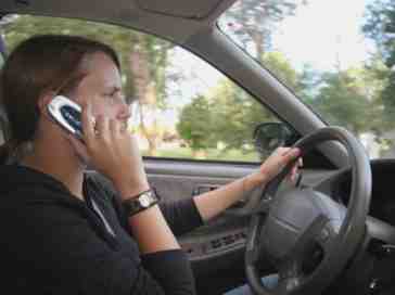 Should all in-car cell phone use be banned?