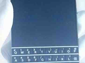 BlackBerry 10 N-Series handset and its QWERTY keyboard pose for a photo