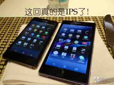 Sony Xperia Z1s poses for a photo next to its Xperia Z1 sibling