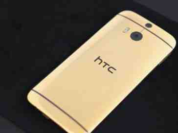 Real gold HTC One (M8) poses for a photograph
