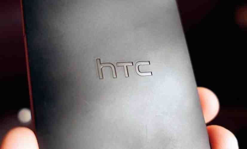HTC One mini poses for another photo next to the full-size One